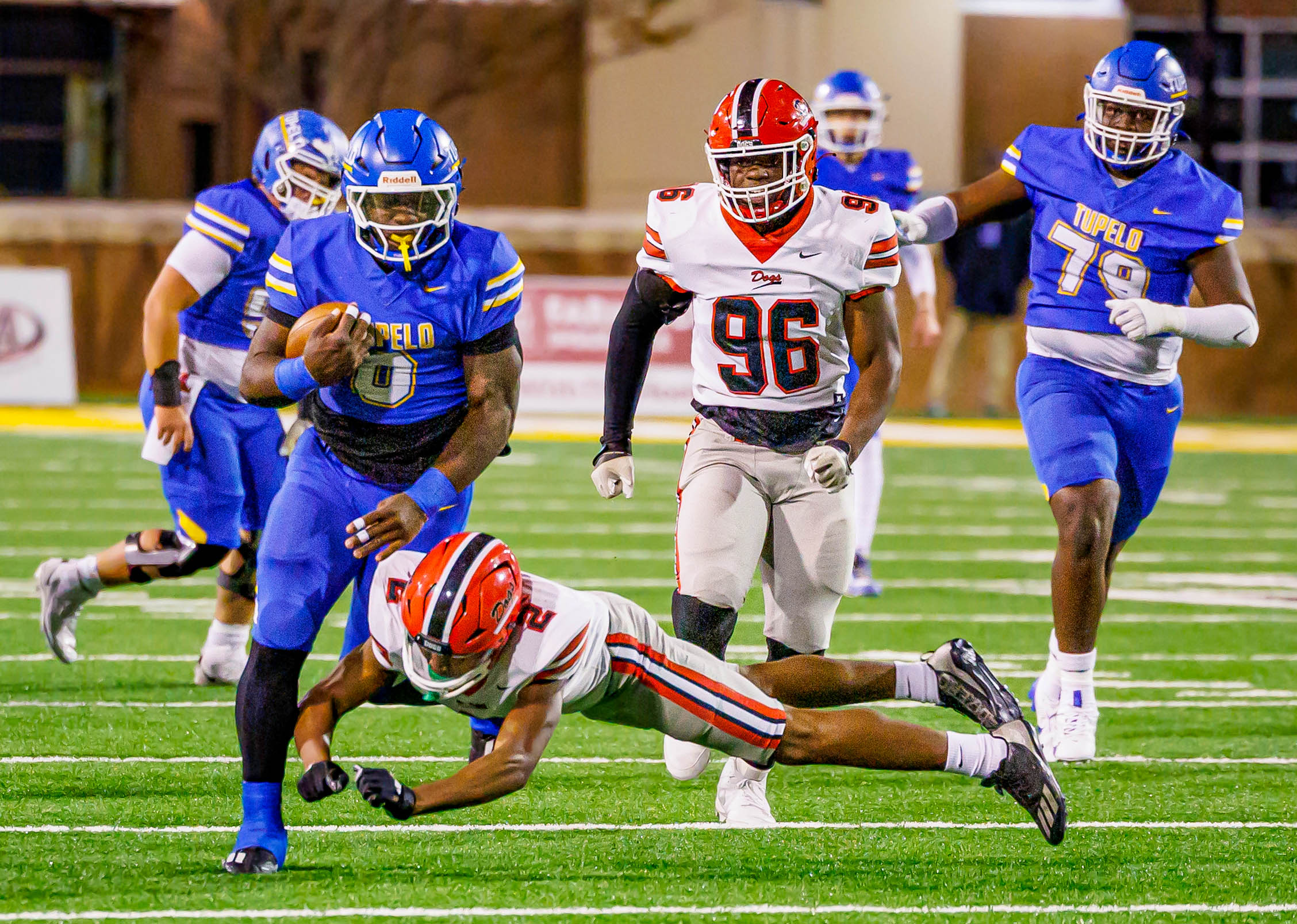 Jaeden Hill breaks a tackle as he breaks away for a 24-yard run.