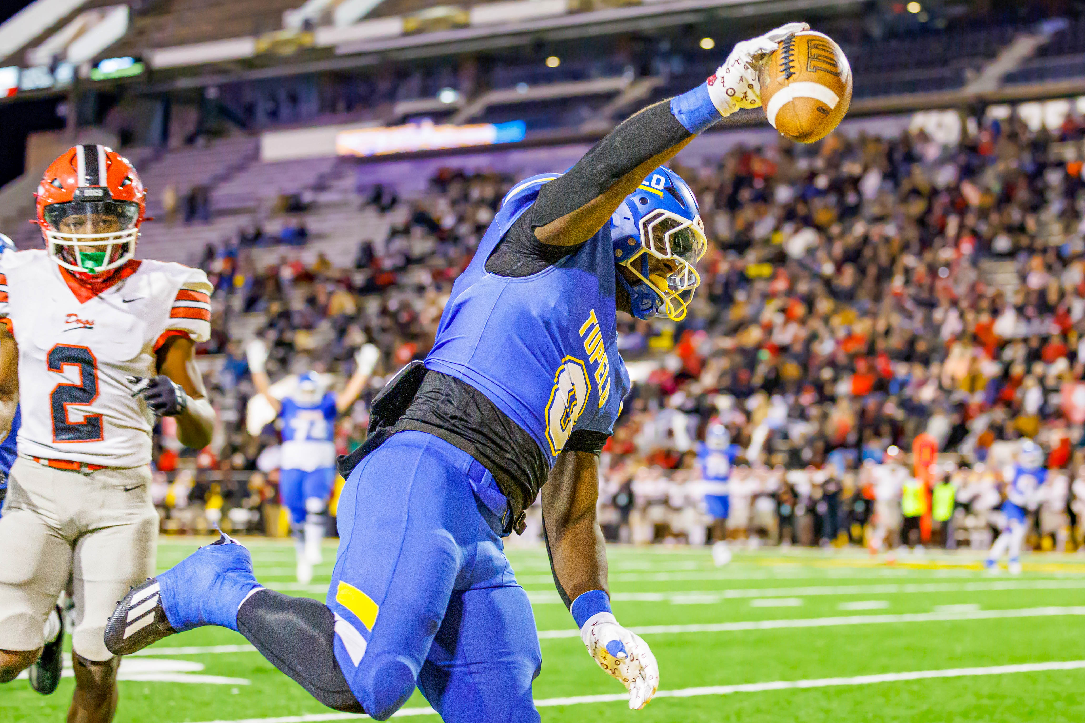 Hill celebrates after scoring two touchdowns in the first half.