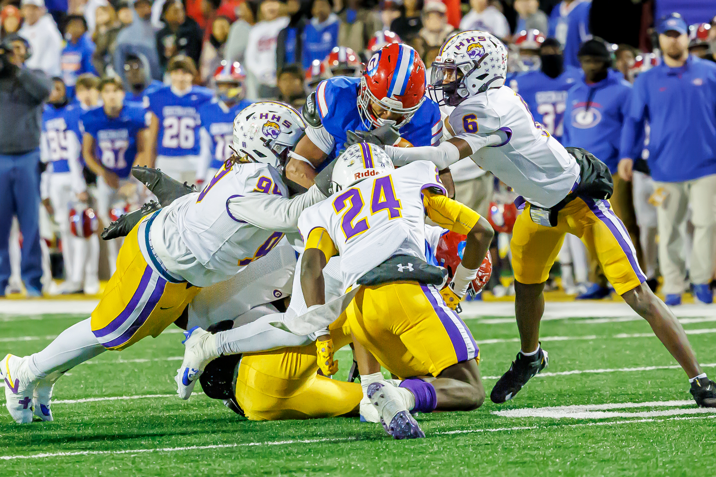 Hattiesburg's defense swarms Macaleb Taylor.
