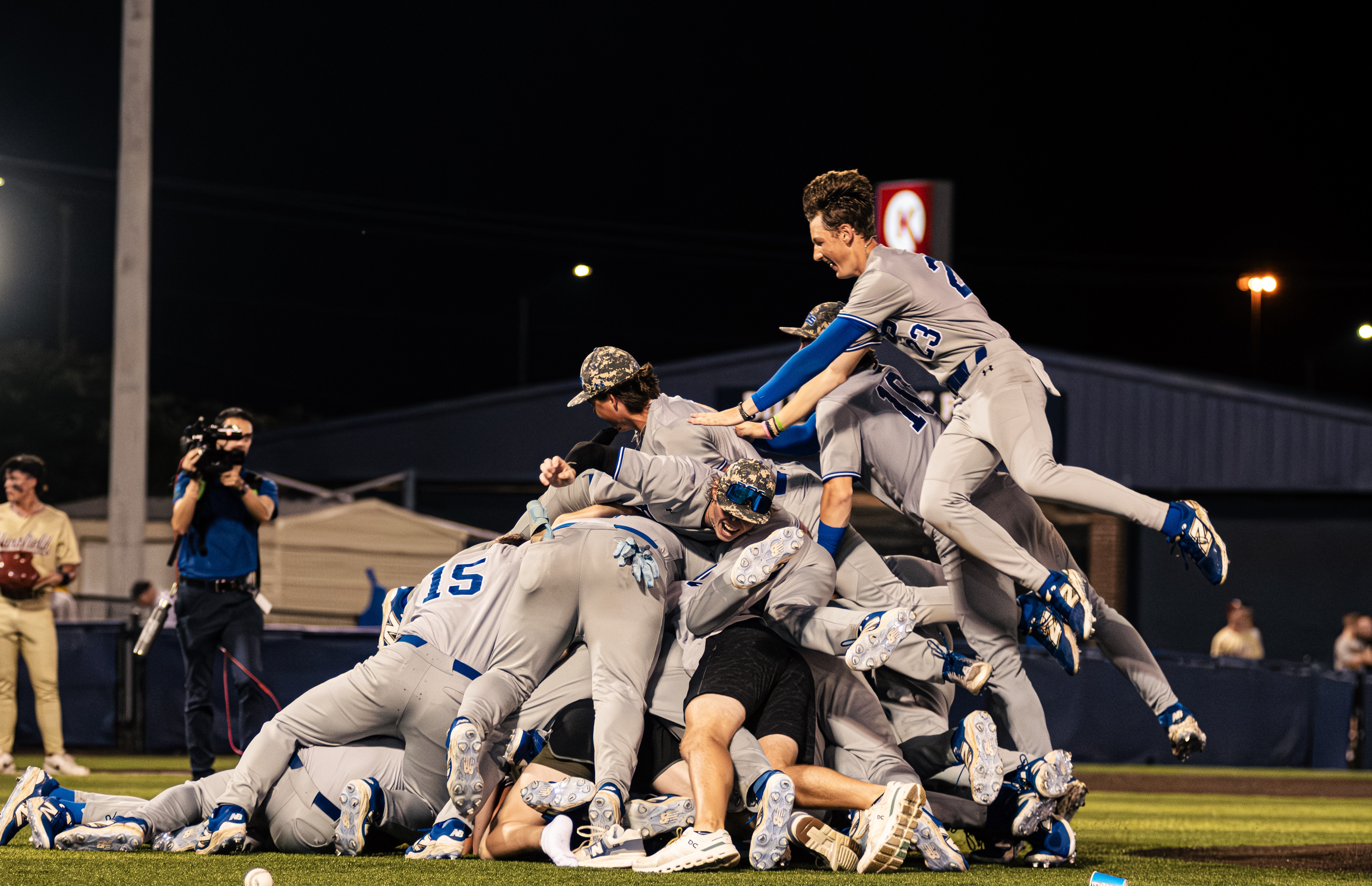 PCS' baseball team dogpiles after recording the final out against Hartfield Academy in the MAIS Class 6A State Championship at Frierson Field on Saturday night. Photo by Landon Joy.