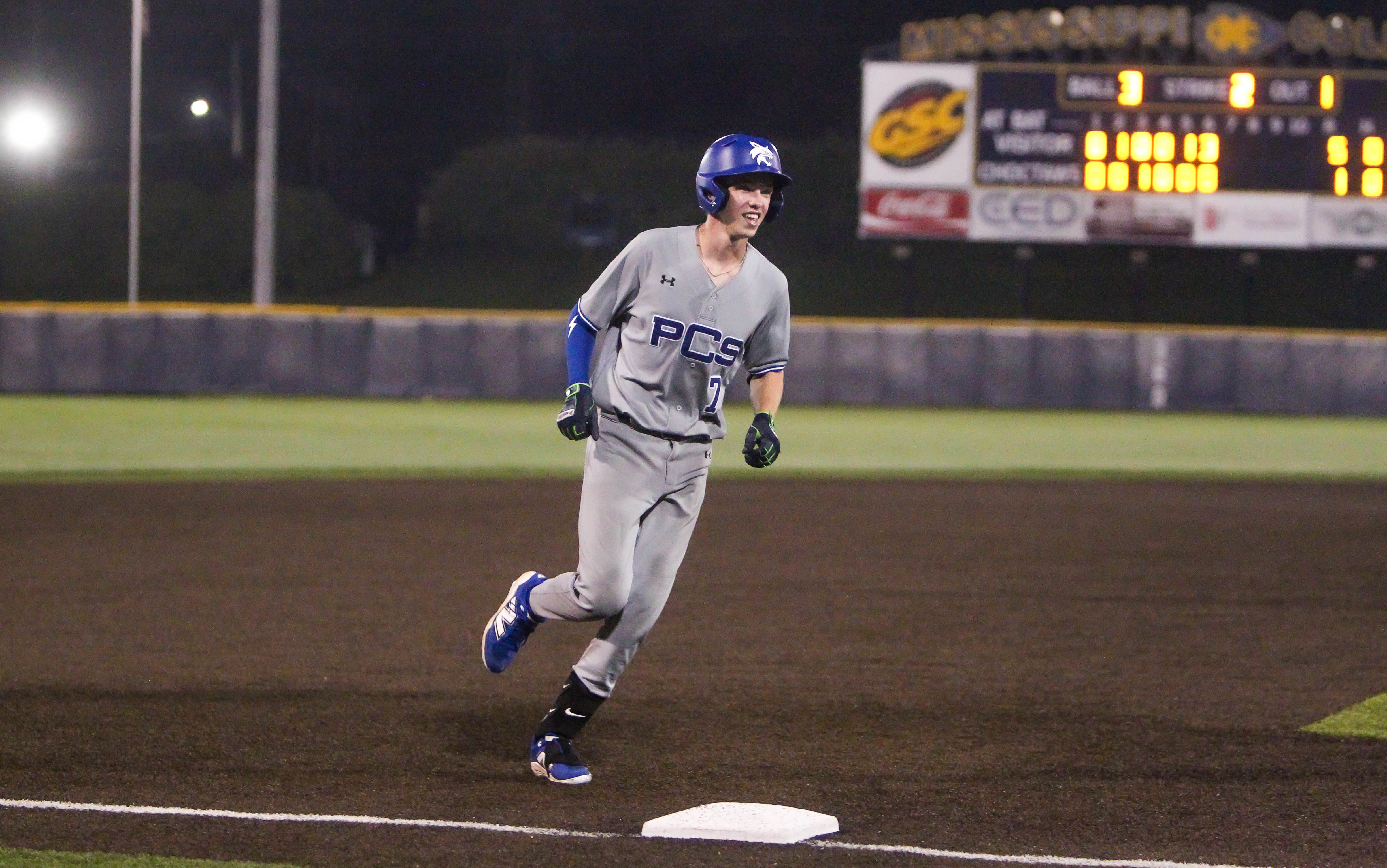 Reed Bridges rounds third base after hitting a grand slam over the left field wall in the top of the seventh inning. Photo by Andrew Abadie.