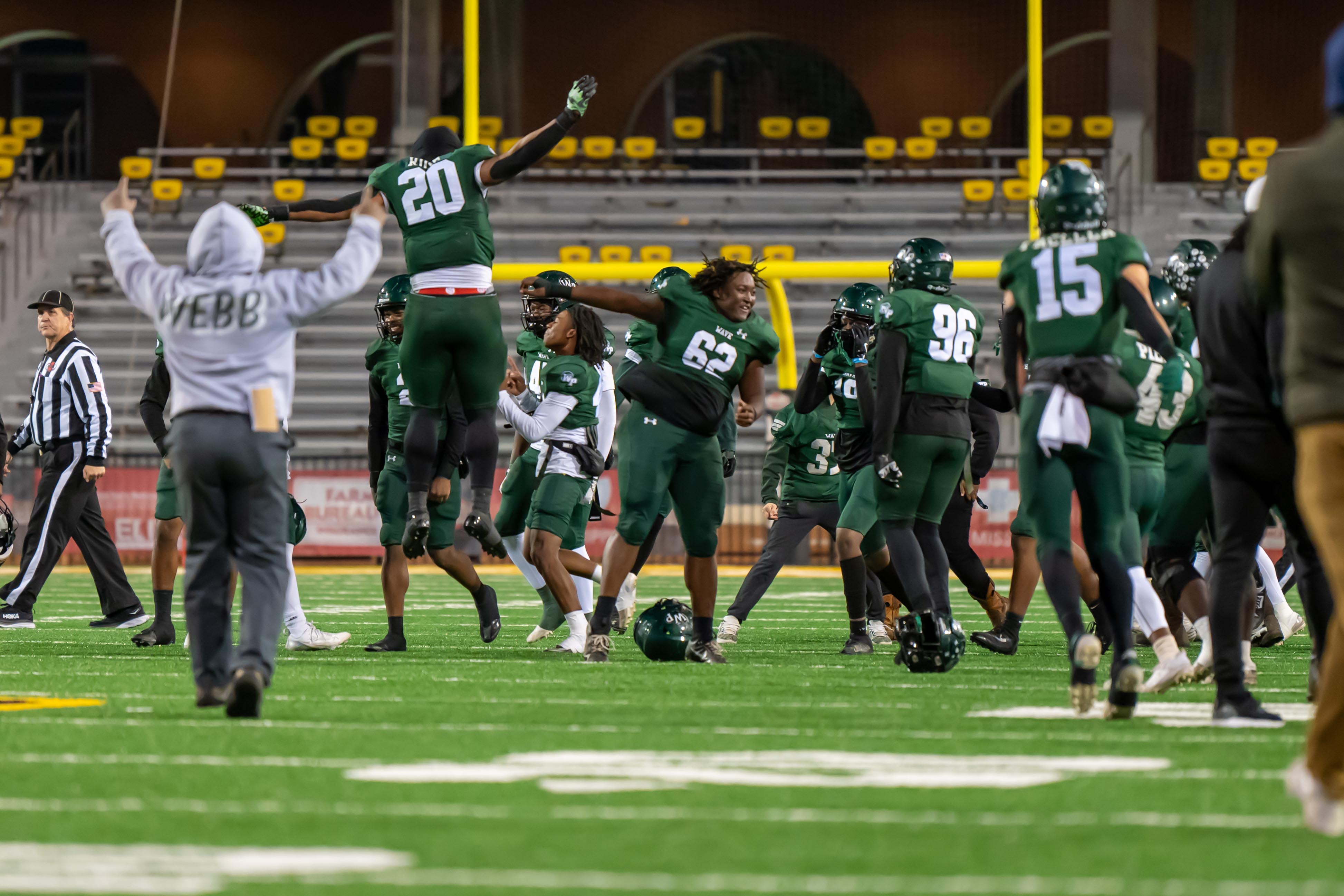 West Point storms the field after defeating Gautier in the Class 5A State Championship.