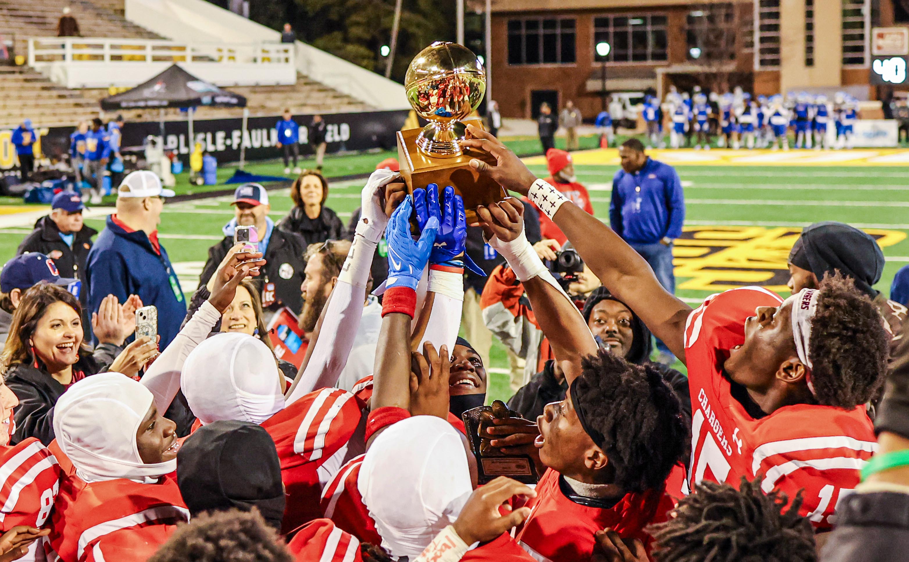 Noxubee County celebrates with the Class 3A State Championship trophy