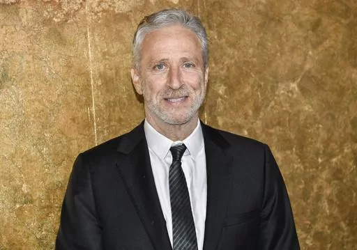 Jon Stewart attends The Albies hosted by the Clooney Foundation for Justice at the New York Public Library in New York on Sept. 28, 2023. Stewart is rewinding the clock, returning to “The Daily Show” as an occasional host and executive producing through the 2024 U.S. elections cycle. Comedy Central on Wednesday said Stewart will host the topical TV show, the perch he ruled for 16 years starting in 1999, every Monday starting Feb. 12. (Photo by Evan Agostini/Invision/AP, File)