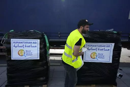 A member of the World Central Kitchen prepares a pallet with the humanitarian aid for transport to the port of Larnaca from where it will be shipped to Gaza, at a warehouse near Larnaca, Cyprus, on March 13, 2024. World Central Kitchen, the food charity founded by celebrity chef José Andrés, called a halt to its work in the Gaza Strip after an apparent Israeli strike killed seven of its workers, mostly foreigners. (AP Photo/Petros Karadjias, File)