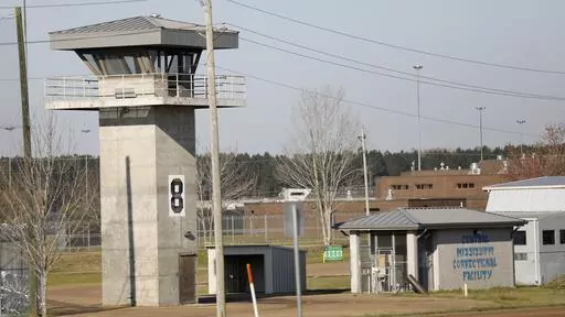A watch tower stands high on the grounds of the Central Mississippi Correctional Facility, March 20, 2019, in Pearl, Miss. Incarcerated women in Mississippi were forced to mix raw cleaning chemicals without protective equipment, with one alleging she later contracted terminal cancer and was denied timely medical care, a federal lawsuit filed Wednesday, Feb. 14, 2024, alleges. (AP Photo/Rogelio V. Solis, File)