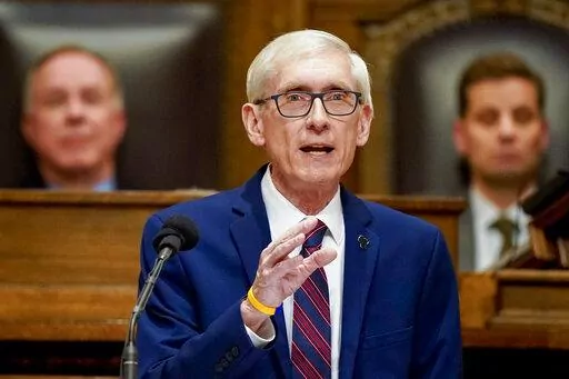 Wisconsin Gov. Tony Evers addresses a joint session of the Legislature in the Assembly chambers at the state Capitol in Madison, Wis. on Feb. 15, 2022. Wisconsin Democrats gathering for their annual state convention this weekend are focused on reelecting Gov. Evers and defeating Republican Sen. Ron Johnson, but also know that history is against them in the midterm year as voters face high inflation, rising gas prices and growing concerns about a recession. Evers and Democratic candidates seeking