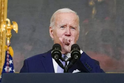 President Joe Biden coughs as he speaks about "The Inflation Reduction Act of 2022" in the State Dining Room of the White House in Washington, Thursday, July 28, 2022. Biden tested positive for COVID-19 again Saturday, July 30, slightly more than three days after he was cleared to exit coronavirus isolation, the White House said, in a rare case of “rebound” following treatment with an anti-viral drug. (AP Photo/Susan Walsh, File)