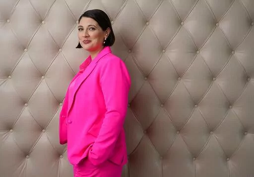 Taylor Jenkins Reid, author of the novel "Daisy Jones and the Six," poses for a portrait at the Four Seasons Hotel, Wednesday, Feb. 22, 2023, in Los Angeles. (AP Photo/Chris Pizzello)