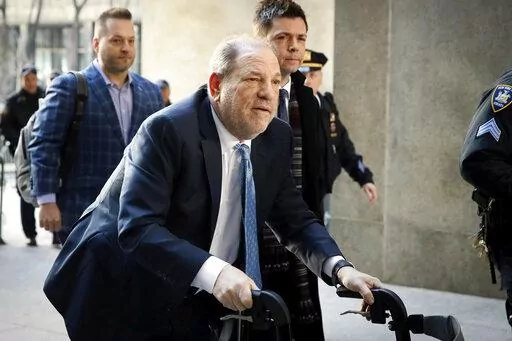 Harvey Weinstein arrives at a Manhattan courthouse as jury deliberations continue in his rape trial in New York, on Feb. 24, 2020. A New York appellate court on Thursday, June 2, 2022, has upheld Weinstein's rape conviction, rejecting the disgraced movie mogul's claims that the judge at the landmark #MeToo trial prejudiced him by allowing women to testify about allegations that weren't part of the criminal case. (AP Photo/John Minchillo, File)