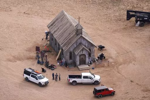 This aerial photo shows the movie set of "Rust" at Bonanza Creek Ranch in Santa Fe, N.M., on Oct. 23, 2021. Prosecutors have dropped the possibility of a sentence enhancement that could have carried a mandatory five-year sentence against Alec Baldwin in the fatal film-set shooting, according to new court filings made public Monday, Feb. 20, 2023. (AP Photo/Jae C. Hong, File)