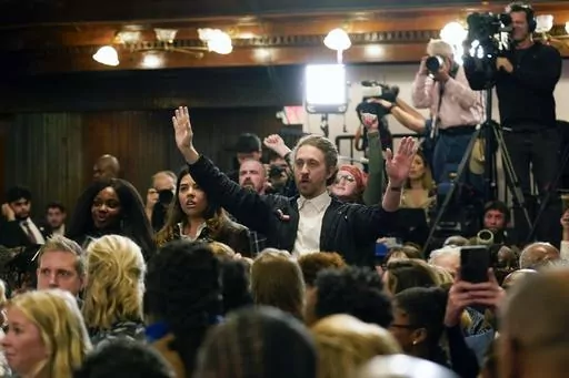 Protestors against the Israel-Hamas war chant "cease-fire now" as President Joe Biden delivers his speech at Mother Emanuel AME Church in Charleston, S.C., Jan. 8, 2024. Biden is increasingly contending with protests inside and outside his events from progressives upset about U.S. support for Israel in its offensive in Gaza. (AP Photo/Stephanie Scarbrough, File)
