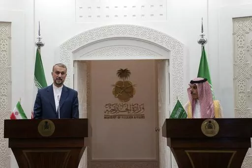In this picture released by the Iranian Foreign Ministry, Iran's Foreign Minister Hossein Amirabdollahian, left, speaks during a joint news briefing with his Saudi Arabian counterpart Prince Faisal bin Farhan Al Saud in Riyadh, Saudi Arabia, Thursday, Aug. 17, 2023. Iran's foreign minister traveled to Saudi Arabia on Thursday, marking the first trip to the kingdom by Tehran's top diplomat in years after the two nations reached a détente with Chinese mediation. (Iranian Foreign Ministry via AP)