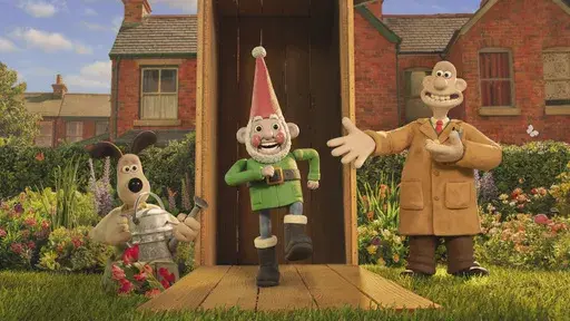 This image released by Netflix shows the characters Gromit, left, and Wallace, voiced by Ben Whitehead, right, with their robot knome, Norbot, voiced by Reece Shearsmith, in a scene from the film "Wallace & Gromit: Vengeance Most Fowl." (Netflix via AP)