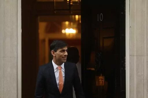 FILE -British newly appointed Chancellor of the Exchequer Rishi Sunak leaves 10 Downing Street, where he was given the job by Britain's Prime Minister Boris Johnson, in London, Thursday, Feb. 13, 2020. Sunak ran for Britain’s top job and lost. Now he’s back with a second chance to become prime minister. (AP Photo/Matt Dunham, File)