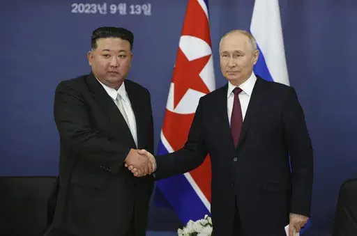 Russian President Vladimir Putin, right, and North Korean leader Kim Jong Un shake hands during their meeting at the Vostochny cosmodrome outside the city of Tsiolkovsky, about 200 kilometers (125 miles) from the city of Blagoveshchensk in the far eastern Amur region, Russia on Sept. 13, 2023. North Korean leader Kim hailed the country's relationship with Russia on Wednesday, June 12, 2024, as reports suggest that Russian President Putin will soon visit the isolated country for his third meeting