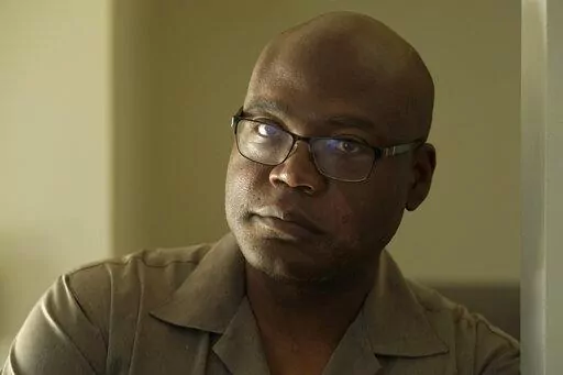 Terrence Hersey stands for a portrait at his home Friday, June 17, 2022, in South Holland, Ill. Hersey underwent extensive rehabilitation for a stroke in 2015, before his doctors eventually cleared him to return to work in 2016. But Union Pacific decided without ever having a doctor examine him that the stroke made him unfit to work for the railroad. Union Pacific has already lost three lawsuits over the way it dismisses employees with health conditions because of safety concerns, and the prospe