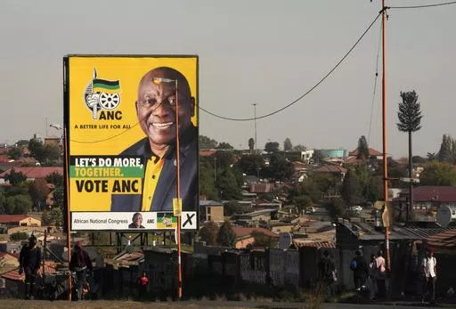 An election poster, with President Cyril Ramaphosa atop a pole in Soweto, South Africa, on April 22, 2024. Ramaphosa has tried to rebuild the reputation of the ANC by cracking down on government graft, but unemployment has risen to 32% under him and he has struggled to curb poverty. (AP Photo/Themba Hadebe, File)