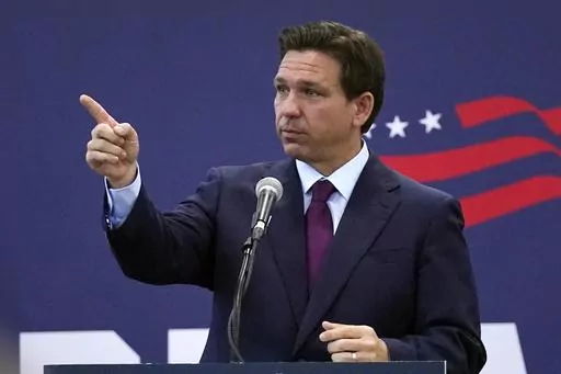 Republican presidential candidate Florida Gov. Ron DeSantis gestures during a campaign event, Monday, July 31, 2023, in Rochester, N.H. (AP Photo/Charles Krupa)