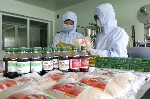 Employees of Junggu Koryo Medicine Pharmaceutical Factory produce Koryo medicines in Pyongyang, on June 7, 2022. North Korea has been driving to increase the production of both modern and traditional (Koryo) medicine to fight the COVID-19 illness. (AP Photo/Cha Song Ho, File)