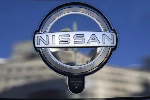 A Nissan logo is seen on a car at its showroom in Tokyo, Feb. 21, 2023. Nissan is recalling more than 809,000 small SUVs in the U.S. and Canada, Tuesday, Feb. 28, because a key problem can cause the ignition to shut off while they’re being driven. The recall covers Rogues from the 2014 through 2020 model years, as well as Rogue Sports from 2017 through 2022. (AP Photo/Shuji Kajiyama, File)