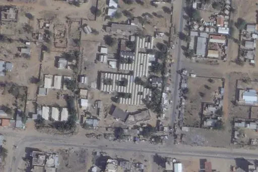 This satellite photo from Planet Labs PBC shows the Saudi Teaching Maternal Hospital, center, in El Fasher, Sudan, Saturday, Jan. 25, 2025. (Planet Labs PBC via AP)