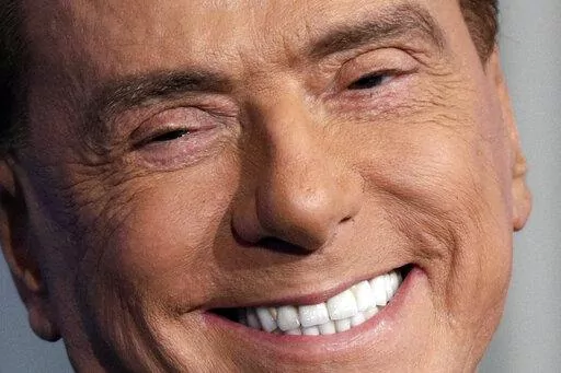 Italian former Premier and Forza Italia (Go Italy) party leader, Silvio Berlusconi, smiles during the recording of the Italian state television RAI, Porta a Porta (Door To Door) TV talk show in Rome Thursday, Jan. 11, 2018. Italy is poised to elect a new president, a figure who is supposed to serve as the nation's moral compass and foster unity by being above the political fray. Silvio Berlusconi thinks he fits the bill. (AP Photo/Andrew Medichini, File)