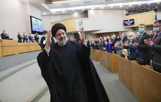 In this handout photo released by The State Duma, The Federal Assembly of The Russian Federation Press Service, Iranian President Ebrahim Raisi gestures after delivering his speech at the State Duma, the Lower House of the Russian Parliament in Moscow, Russia, Jan. 20, 2022. Russia’s war on Ukraine has exposed just how much Iran has tilted toward Moscow in recent years. Among ordinary Iranians, there is a great deal of sympathy for Ukraine. (The State Duma, The Federal Assembly of The Russian 