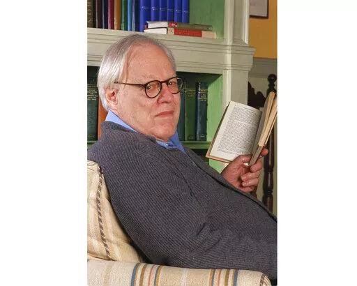 Jason Epstein sits in his home on Jan. 8, 2001, in New York.  Epstein, a publishing innovator and bon vivant who helped put the classics in paperback, co-founded The New York Review of Books and worked with such novelists as E.L. Doctorow, Vladimir Nabokov and Philip Roth, has died at age 93. (AP Photo/Jim Cooper, File)