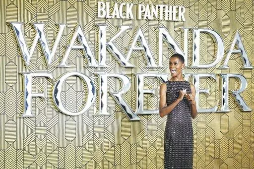 Letitia Wright poses for photographers upon arrival for the premiere of the film 'Black Panther: Wakanda Forever' in London, Thursday, Nov. 3, 2022. (Photo by Scott Garfitt/Invision/AP)