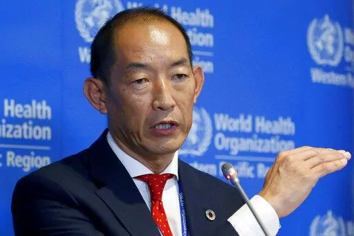 FILE – World Health Organization Regional Director for Western Pacific Takeshi Kasai addresses the media at the start of the five-day annual session Monday, Oct. 7, 2019, in Manila, Philippines. Current and former staffers have accused Kasai of racist, unethical and abusive behavior that has undermined the U.N. health agency’s efforts to curb the coronavirus pandemic. The allegations were laid out in an internal complaint filed in October 2021 and an email in January 2022 sent by unidentifie