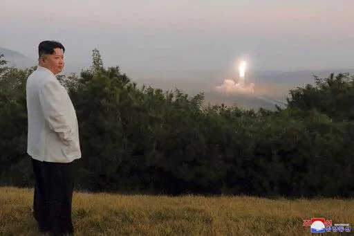 This photo provided on Oct. 10, 2022, by the North Korean government, North Korean leader Kim Jong Un inspects a missile test at an undisclosed location in North Korea, as taken sometime between Sept. 25 and Oct. 9. Independent journalists were not given access to cover the event depicted in this image distributed by the North Korean government. The content of this image is as provided and cannot be independently verified. Korean language watermark on image as provided by source reads: "KCNA" wh