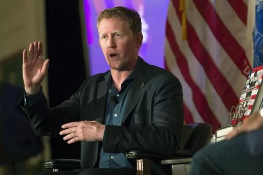 FILE -- Former Navy SEAL Robert O'Neill, who claims to have fatally shot Osama Bin Laden, talks about joining the service at the Richard Nixon Presidential Library and Museum in Yorba Linda, Calif., Wednesday, July 26, 2017. O'Neill has a small ownership stake in Armed Forces Brewing Company and has served as its brand ambassador. His recent social media complaint about a Navy sailor who performs as a drag queen and a police report alleging he used a racial slur are fueling efforts to stop the b