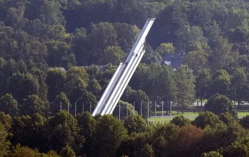 The Monument to the Liberators of Soviet Latvia and Riga from the German Fascist Invaders falls during its demolition in Riga, Latvia, Aug. 25, 2022. Russia's invasion of Ukraine has led to a renewed push to topple the last remaining monuments to the Soviet army that remained in Europe. At the end of the communist era, when Latvia, Lithuania and Estonia regained their independence from the Soviet Union, those countries began renaming streets and toppling statues of Lenin and other communist figu