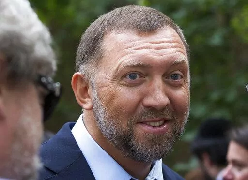 In this July 2, 2015, file photo, Russian metals magnate Oleg Deripaska attends Independence Day celebrations at Spaso House, the residence of the American Ambassador, in Moscow, Russia. Russia’s war on Ukraine has sent shockwaves through the elite global community of wealthy Russians. Some have begun, tentatively, to speak out. Deripaska, Alfa Bank founder Mikhail Fridman and banker Oleg Tinkov have also urged an end to the violence, though none has directly mentioned Putin. (AP Photo/Alexand