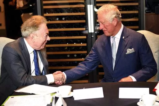 Britain's Prince Charles meets Andrew Lloyd Webber during a visit to the Royal Albert Hall to discuss the arts and creativity in school, in London, Wednesday, Sept. 5, 2018. Andrew Lloyd Webber, the English composer who created the scores for blockbuster musicals such as “Cats,’’ “The Phantom of the Opera’’ and “Evita,’’ has written the anthem for King Charles III’s coronation, adapting a piece of church music that encourages singers to make a “joyful noise.” (Eddie Mulho