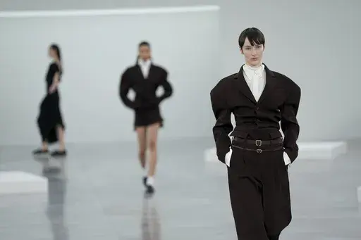 A model wears a creation as part of the Issey Miyake Fall/Winter 2025-2026 Womenswear collection presented in Paris, Friday, March 7, 2025. (Photo by Scott A Garfitt/Invision/AP)