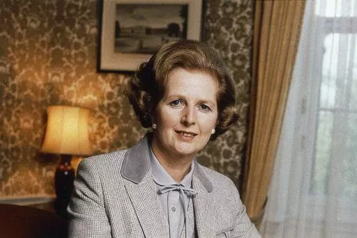  British Prime Minister Margaret Thatcher poses for a photo in this 1980 photo.  Two people are running to be Britain’s next prime minister, but a third presence looms over the contest: Margaret Thatcher. Almost a decade after her death, the late former prime minister casts a powerful spell over Britain's Conservative Party. In the race to replace Boris Johnson as Conservative leader and prime minister, both Foreign Secretary Liz Truss and former Treasury chief Rishi Sunak claim to embody the 