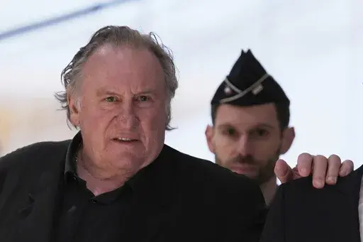 Actor Gerard Depardieu arrives to face trial for the alleged sexual assaults of two women on a film set in 2021, Monday, March 24, 2025 in Paris. (AP Photo/Aurelien Morissard)