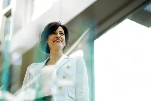 Dr. Rochelle Walensky, director of the U.S. Centers for Disease Control and Prevention, poses during an interview with The Associated Press on Wednesday, Dec. 8, 2021, in Atlanta. More than 40 cases of the omicron variant have been reported in the U.S. so far, with most of them people who were vaccinated and nearly all of them suffering only mild illness, Walensky said Wednesday. ​(AP Photo/Brynn Anderson)