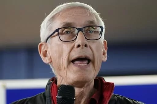 Wisconsin Democratic Gov. Tony Evers speaks at a campaign stop, Oct. 27, 2022, in Milwaukee. A man illegally brought a handgun into the Wisconsin Capitol on Wednesday, demanding to see Gov. Tony Evers, and returned at night with an assault rifle after posting bail, a spokesperson for the state said Thursday, Oct. 5, 2023, (AP Photo/Morry Gash, File)