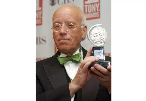 Eugene Lee poses with his Tony Award for Best Scenic Design for "Wicked" at the Tony Awards in New York on June 6, 2004. Lee, the six-time Emmy Award-winning production designer for “Saturday Night Live” and who won three Tony Awards for his Broadway sets, died Tuesday in Providence, R.I. He was 83. (AP Photo/Richard Drew, File)