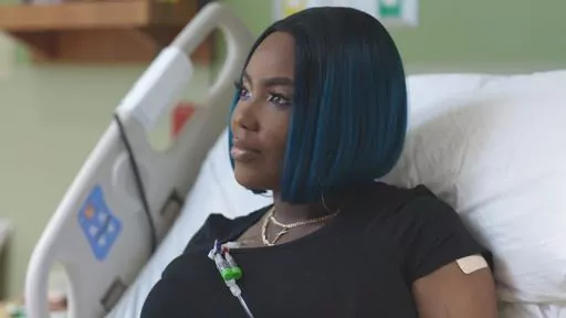 This July 2019 image provided by the Sarah Cannon Research Institute shows Victoria Gray on her infusion day during a gene editing trial for sickle cell disease at the Sarah Cannon Research Institute and The Children's Hospital At TriStar Centennial in Nashville. Gray, the first patient to test the treatment, shared her experience with researchers at a scientific conference in 2023. She described suffering with terrible bouts of pain since childhood and receiving high-dose pain medications and s