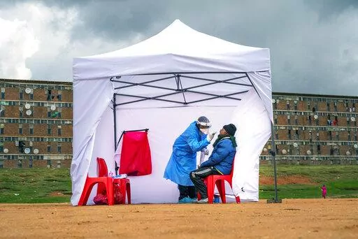 A resident from the Alexandra township gets tested for COVID-19 in Johannesburg, South Africa, Wednesday, April 29, 2020. In a new analysis released Thursday, April 7, 2022, the U.N. health agency reviewed 151 studies of COVID-19 in Africa based on blood samples taken from people on the continent between January 2020 and December 2021. WHO said that by last September, about 65% of people tested had some exposure to COVID-19, translating into about 800 million infections. In contrast, by that tim