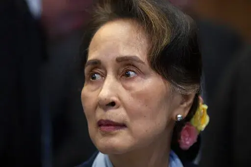 Then Myanmar's leader Aung San Suu Kyi waits to address judges of the International Court of Justice in The Hague, Netherlands, Dec. 11, 2019. On Dec. 30, 2022, the court in army-ruled Myanmar convicted Aung San Suu Kyi on more corruption charges, adding 7 years to her prison term. (AP Photo/Peter Dejong, File)