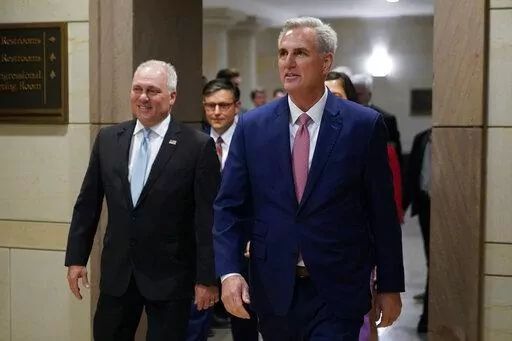 House Minority Leader Kevin McCarthy of Calif., right, and House Minority Whip Steve Scalise, R-La., arrive to speak with members of the press after a House Republican leadership meeting, Nov. 15, 2022, on Capitol Hill in Washington. McCarthy won the House Speaker nomination from his colleagues, while Scalise was voted majority leader. Even with their threadbare House majority, Republicans doubled down this week on using their new power to investigate the Biden administration and in particular t