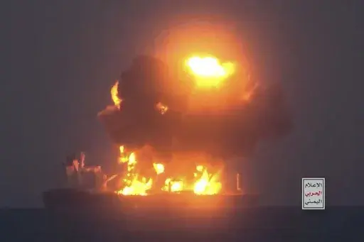 This frame grab from video released by the Ansar Allah Media Office, the media arm of Yemen's Houthi rebels, on Friday, Aug. 23, 2024, shows what the Houthis describe as one of their attacks on the Greek-flagged oil tanker Sounion in the the Red Sea. The logo in the bottom righthand corner of the image reads in Arabic: "Yemeni War Media." (Ansar Allah Media Office via AP)