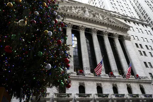 The New York Stock Exchange, Wednesday, Dec. 14, 2022, in New York. The Federal Reserve raised interest rates by half a point on Wednesday. (AP Photo/Julia Nikhinson)