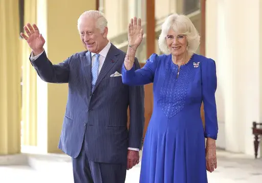 Britain's King Charles III and Queen Camilla, wave as they formally bid farewell to Japan's Emperor Naruhito and Empress Masako on the final day of their state visit to Britain at Buckingham Palace, London, Thursday, June 27, 2024. King Charles III is preparing to visit Australia and Samoa in October 2024, an itinerary that will span 12 time zones and test the monarch’s stamina as he recovers from cancer treatment. The trip was announced on Sunday, July 14, 2024, by Buckingham Palace. (Chris J