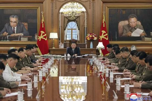 In this undated photo provided by the North Korean government, North Korean leader Kim Jong Un, center, attends a meeting of the North Korean ruling Workers’ Party’s central military commission in Pyongyang, North Korea Wednesday, Aug. 9, 2023. Independent journalists were not given access to cover the event depicted in this image distributed by the North Korean government. The content of this image is as provided and cannot be independently verified. Korean language watermark on image as pr